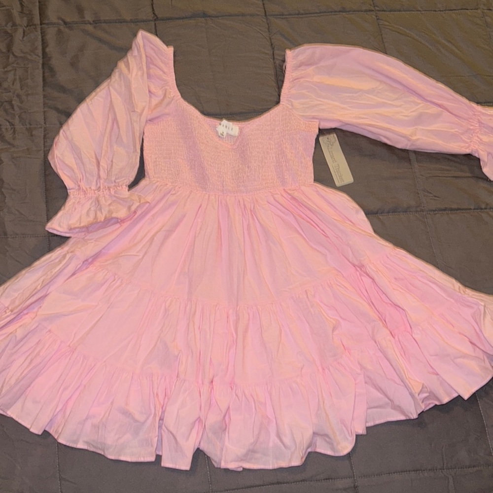 Lizard Thicket pink mini baby doll dress. Size small, but could fit size medium.